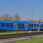 Blue hydrogen train in motion 